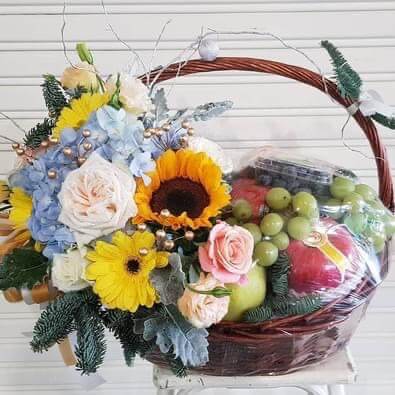 Fruit baskets with flowers - an original gift for delivery in Thailand